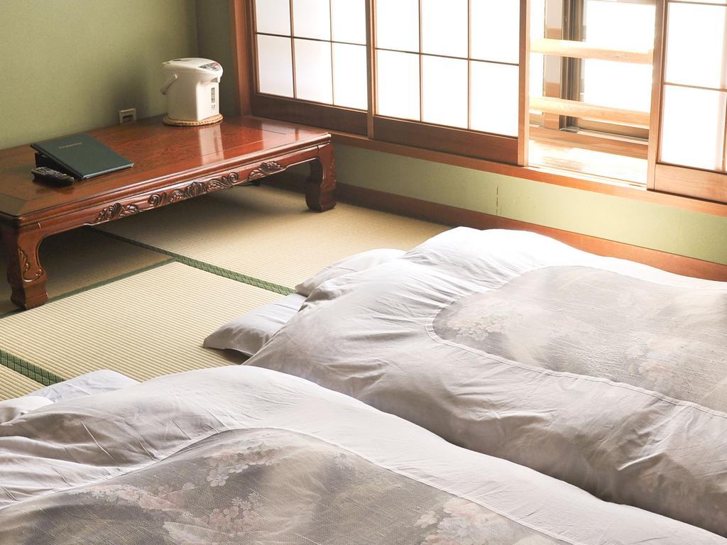 Отель Sazu Onsen Yusho Ками Экстерьер фото