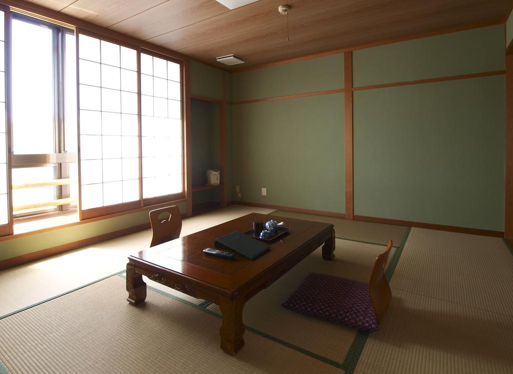Отель Sazu Onsen Yusho Ками Номер фото