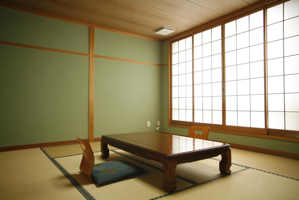 Отель Sazu Onsen Yusho Ками Экстерьер фото
